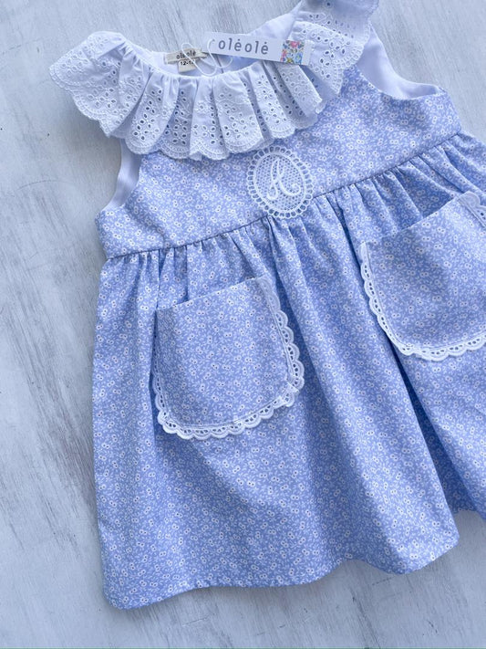 Vestido bolsillo pompón mini fondo azul celeste